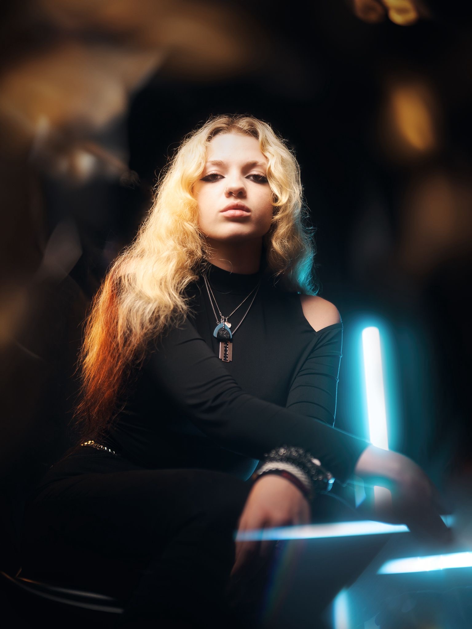 Editorial portrait with blue and amber lighting